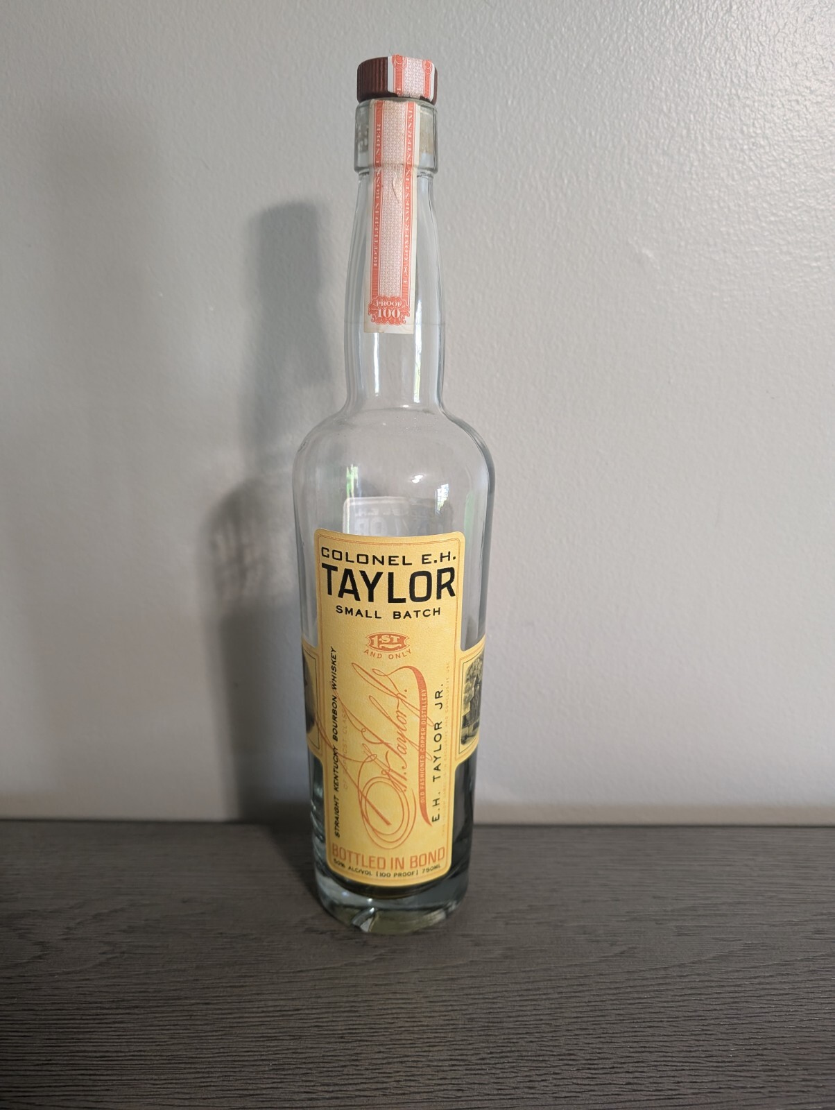Colonel E.H. Taylor Small Batch Kentucky Bourbon whiskey Empty Orange Bottle