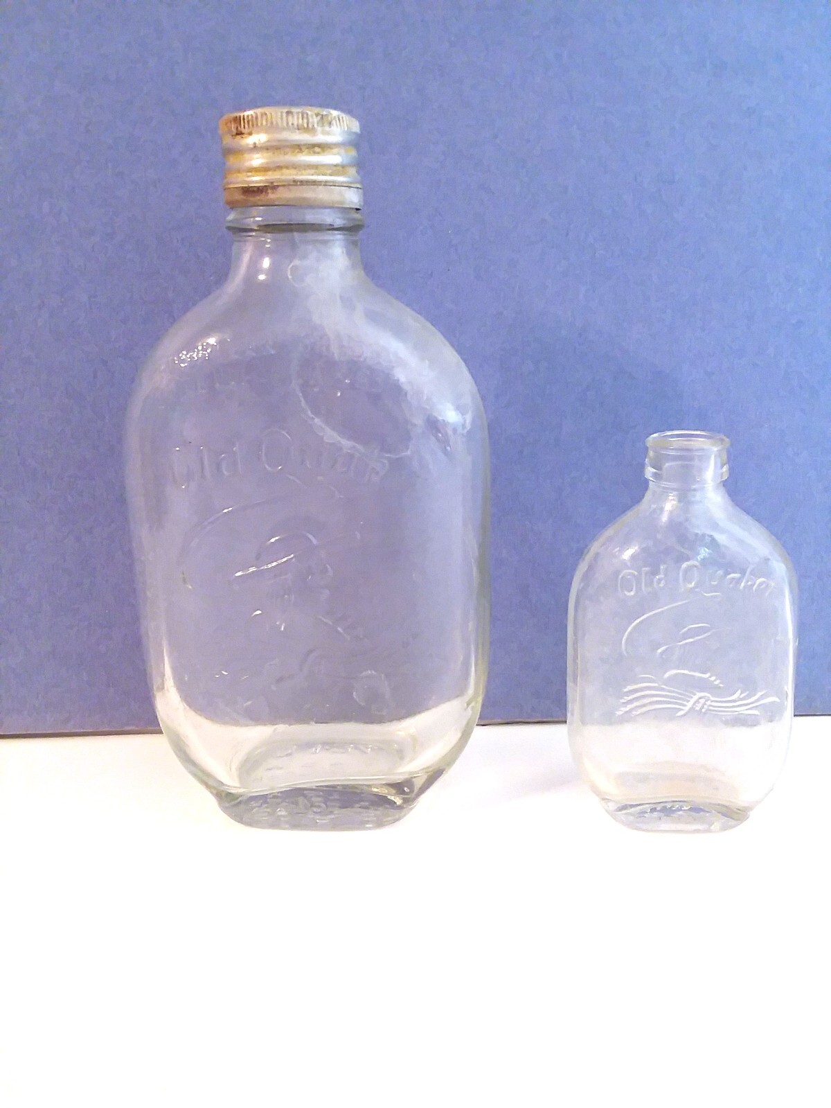 2 Vintage OLD QUAKER Bottles 1956 half pint and 1954 miniature