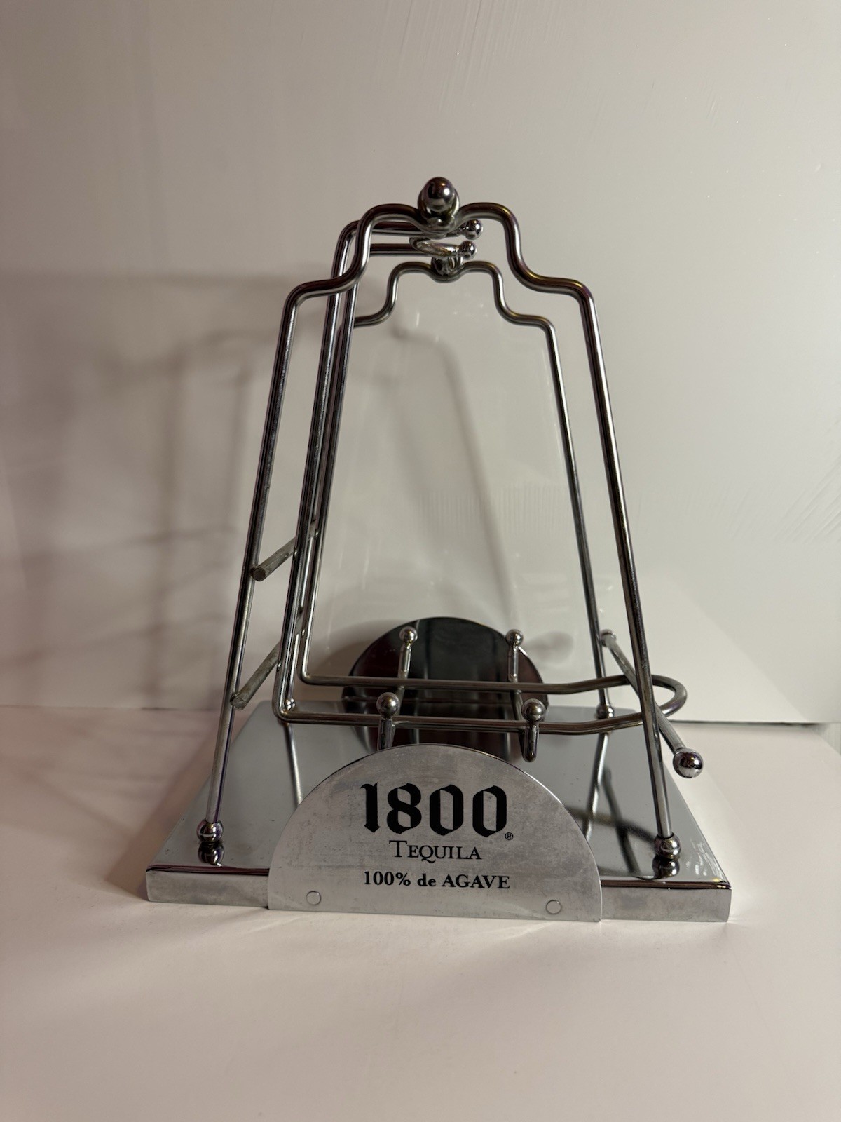 1800 Brand Tequila Chrome Metal Swinging Bottle Display – One Knob Missing