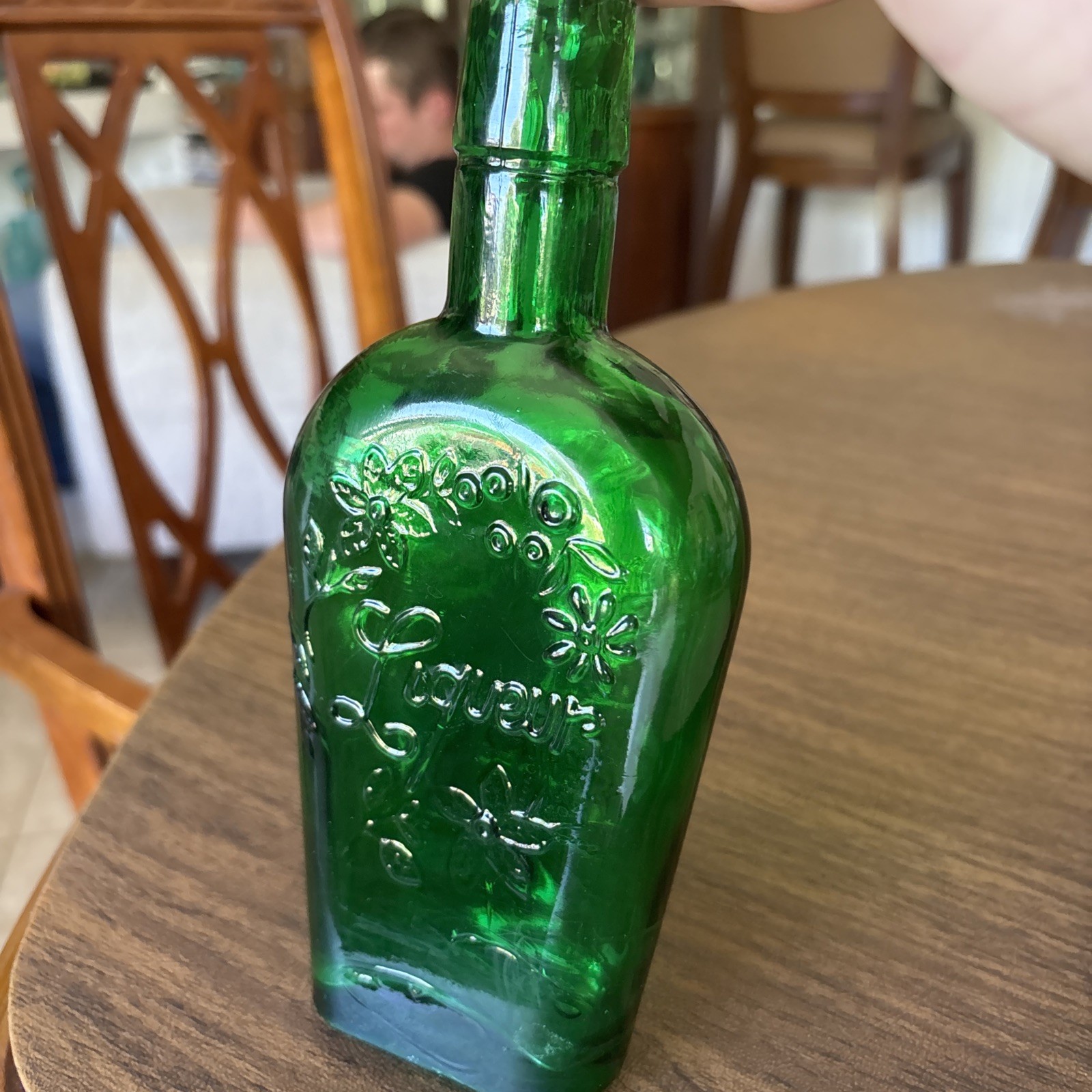 Vtg Wheaton green glass liquor bottle embossed florals and the word «Liqueur».