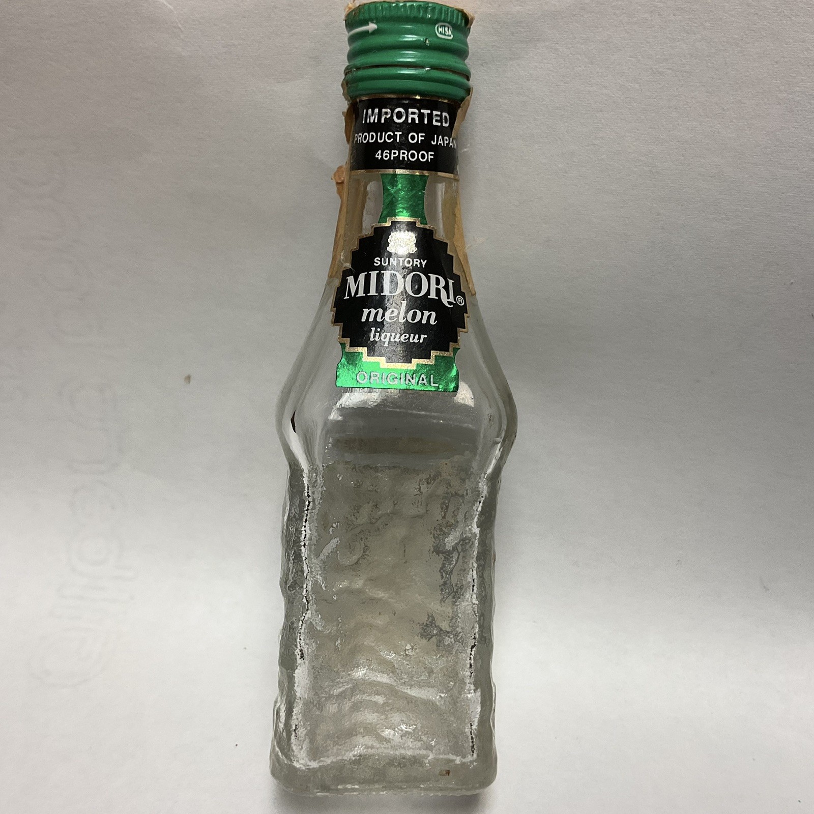 Vintage Glass Bottle. SUNTORY MIDORI MELON.. Liqueur 50ml. Japan.